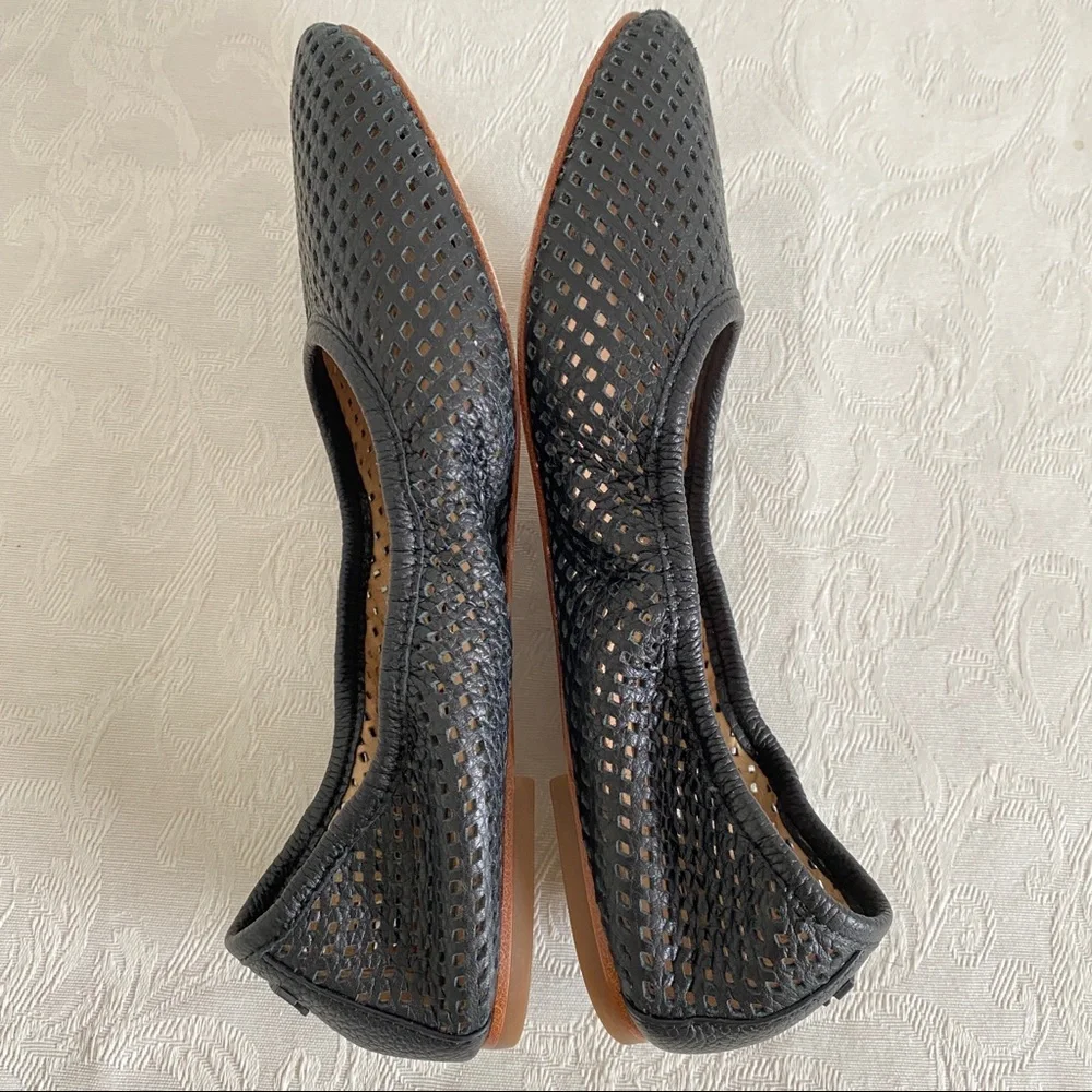 Tory Burch black perforated flats